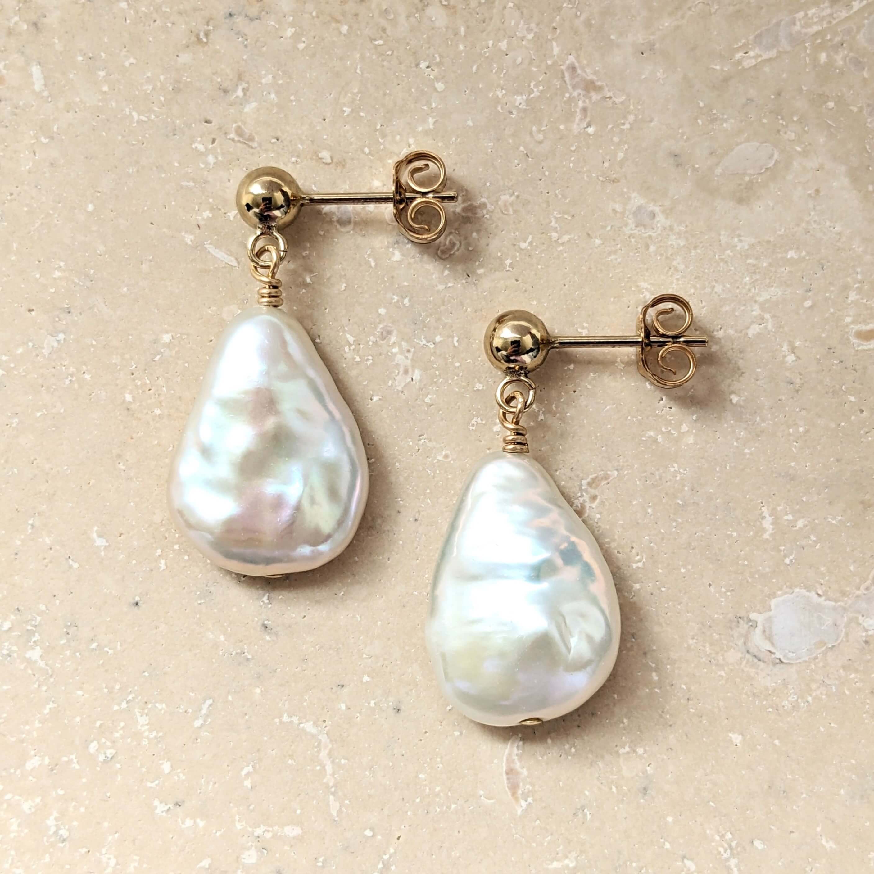 Large flat hot sale pearl earrings